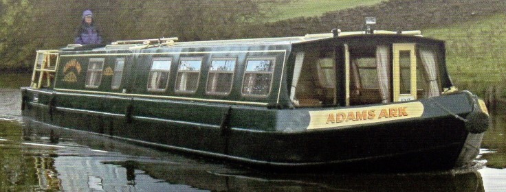 Adams Ark Canal Boat on the water